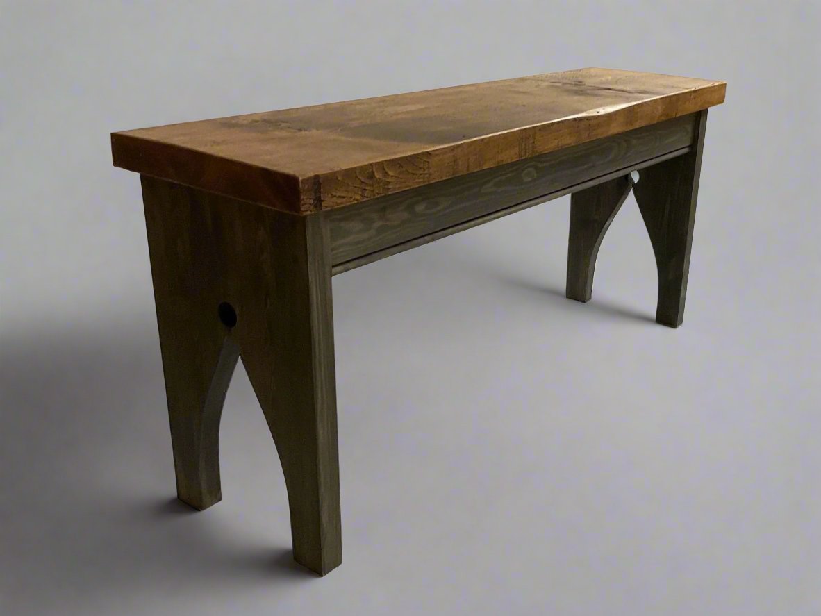 Pine farmhouse bench seat. Black burnt effect frame with chunky pine seat. Arched leg supports.